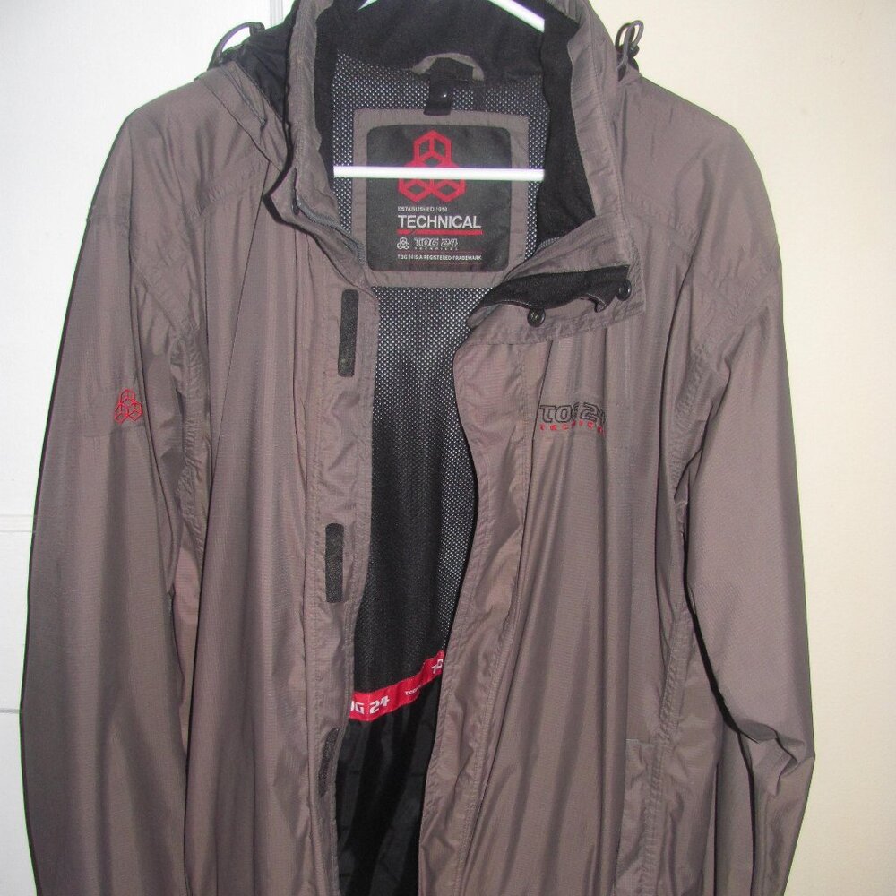 Tog 24 Technical Rain Jacket with Packable Hood. Size Large. Very good preowned